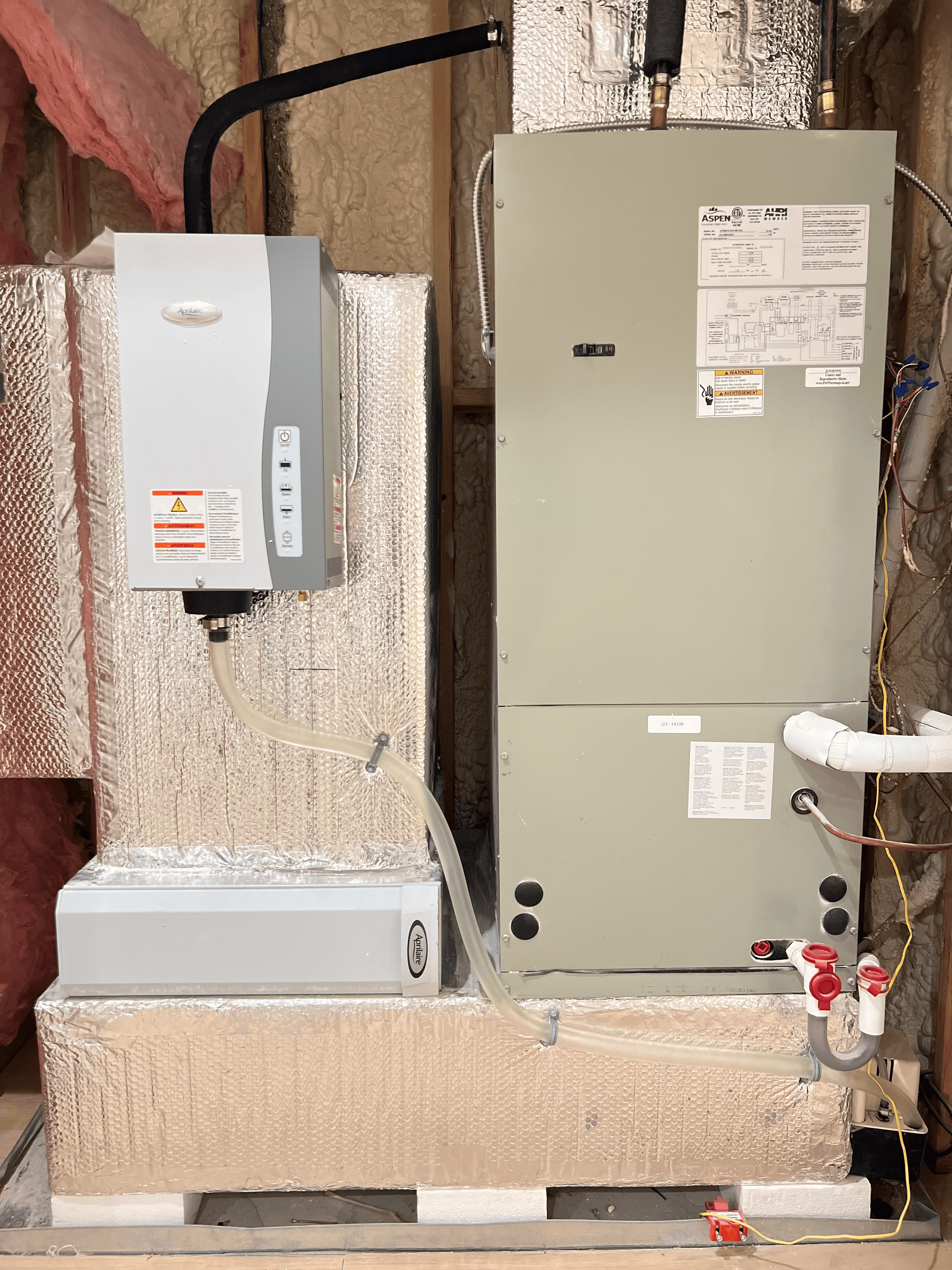 Aprilaire humidifier and air handler installed in crawl space