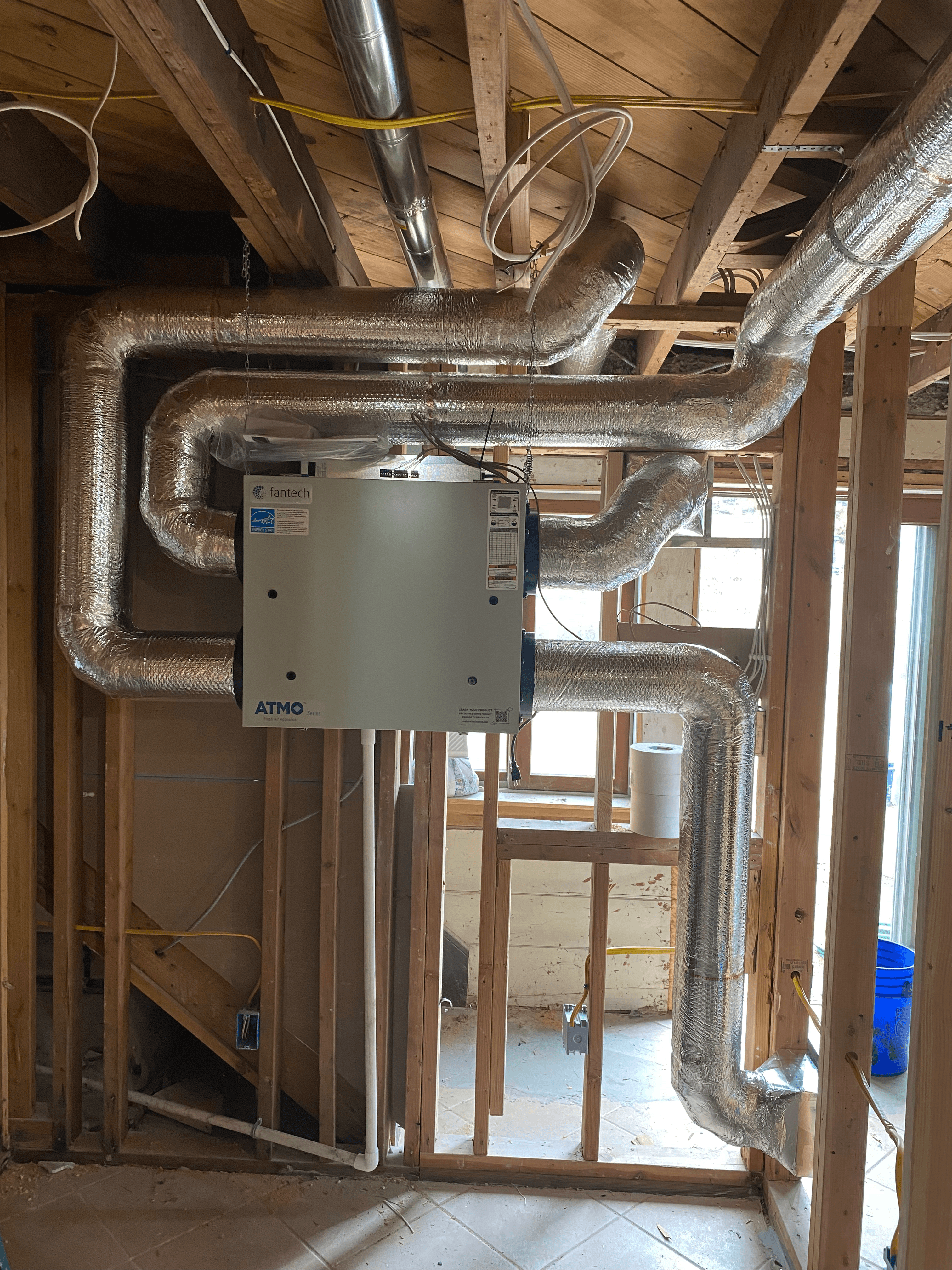 Atmo ERV system with insulated ductwork in new construction