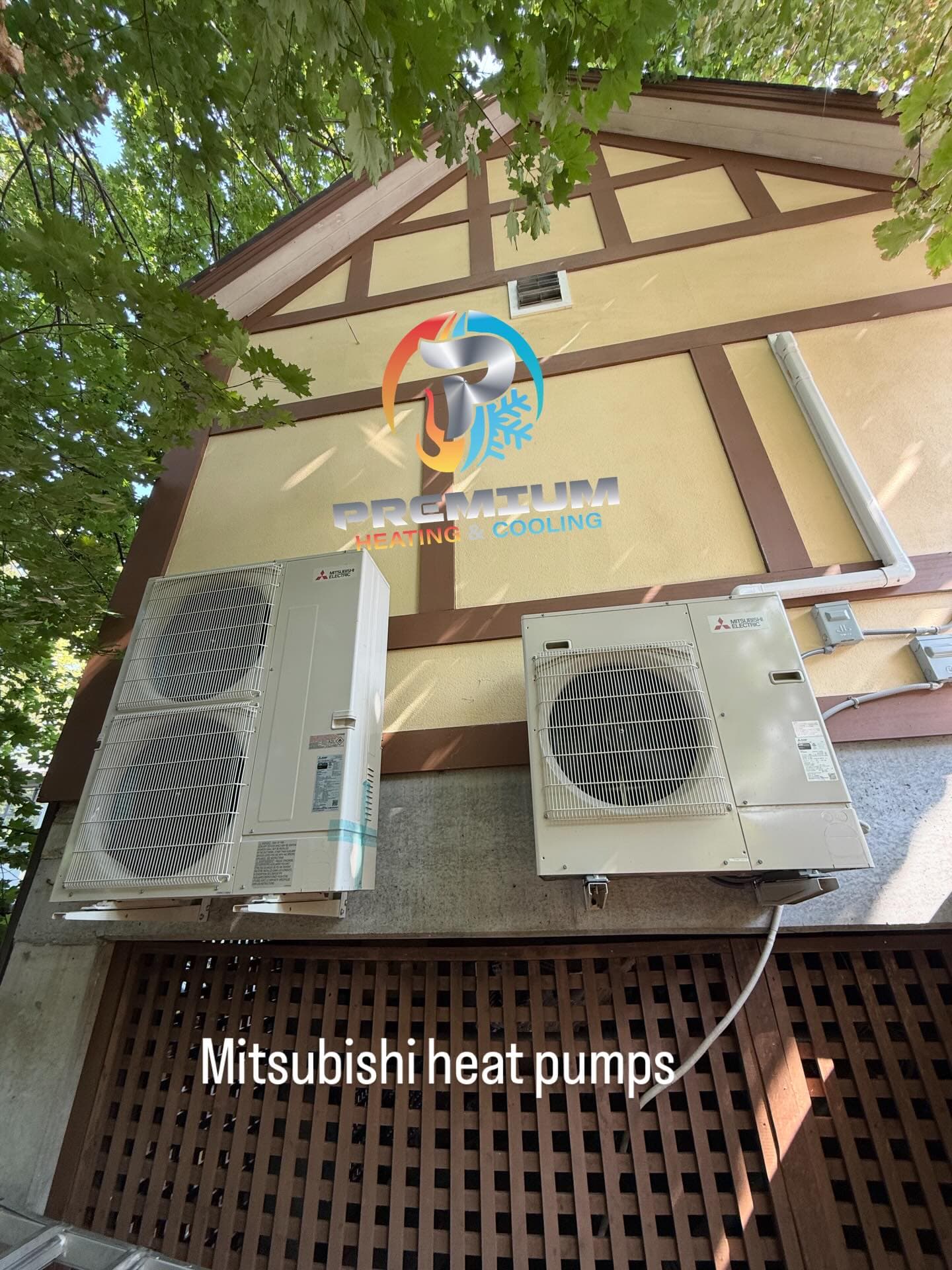 Dual Mitsubishi heat pumps wall-mounted side by side