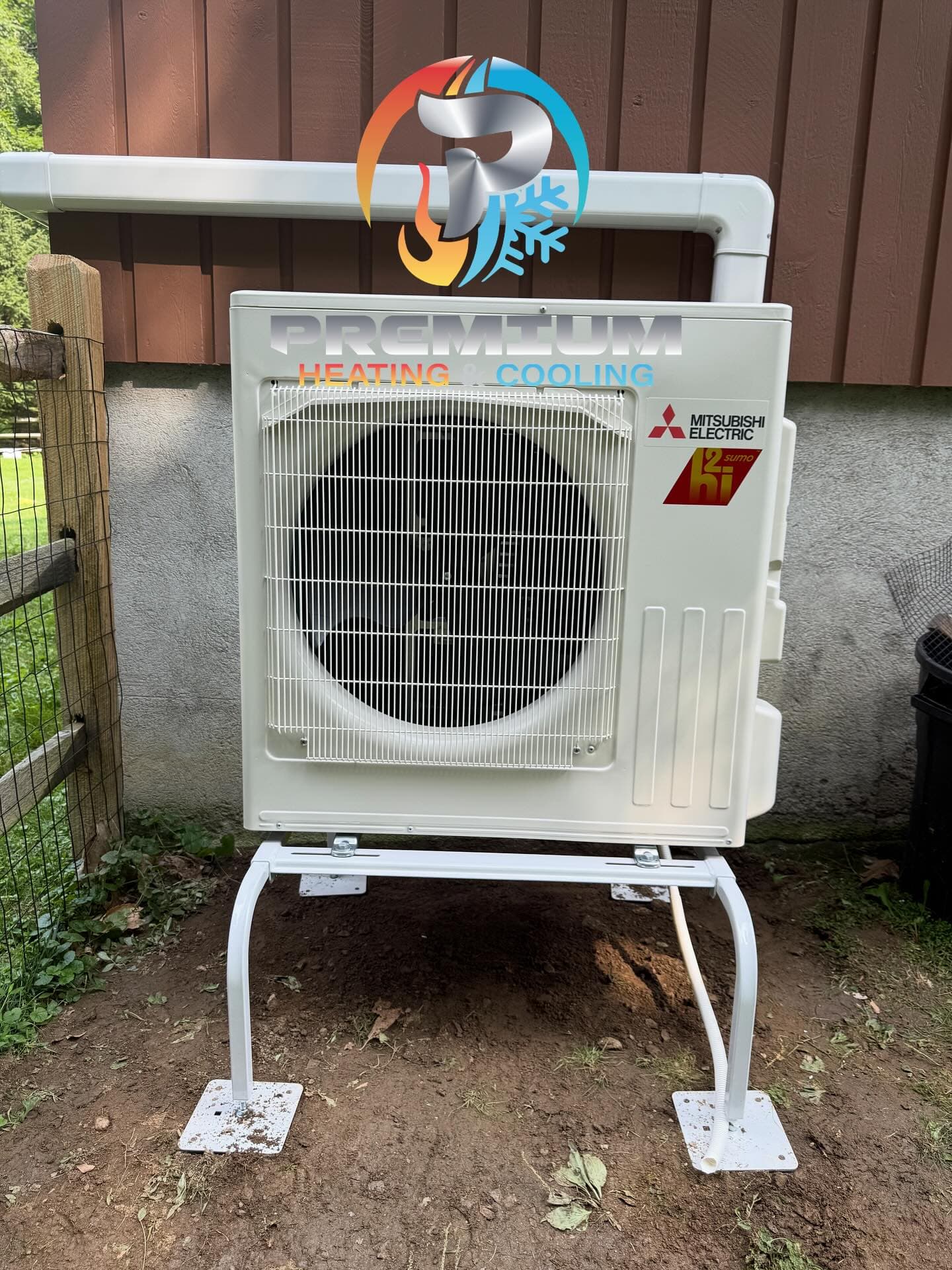 Mitsubishi mini-split outdoor heat pump unit on stand